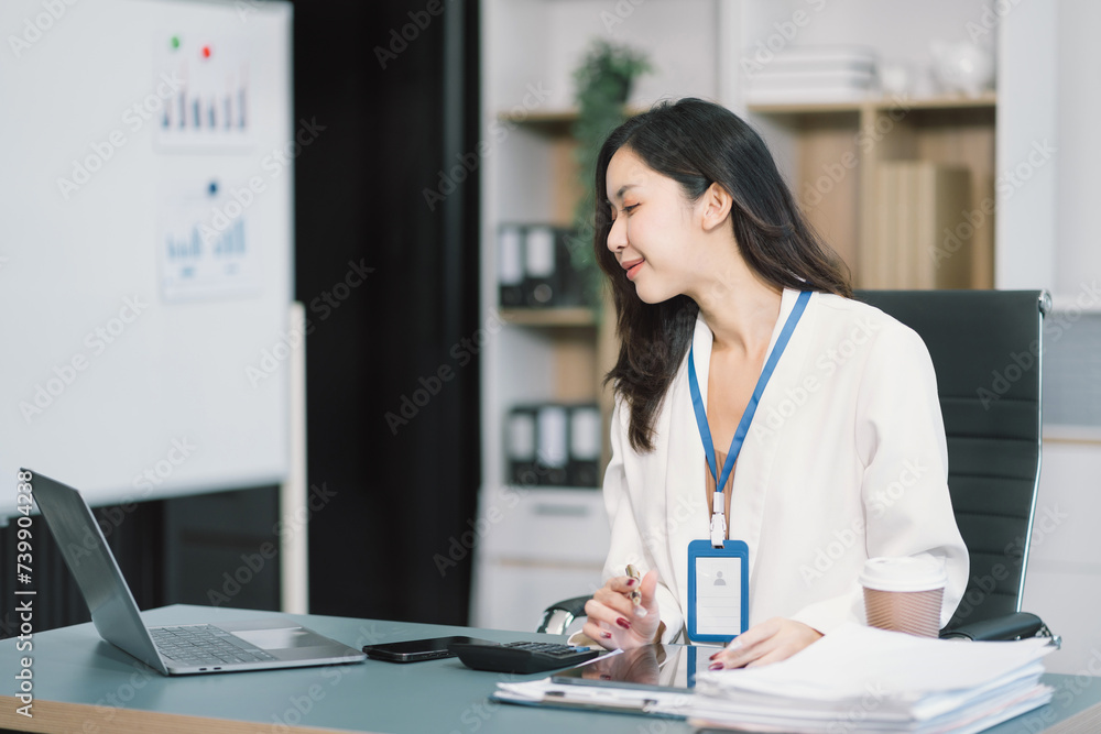 Business woman hand Project manager working and update tasks and Gantt chart scheduling virtual diagram.with smart phone, tablet and laptop in office. Business woman hand Project manager working and update tasks and Gantt chart scheduling virtual diagram.with smart phone, tablet and laptop in office.