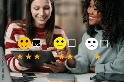 Woman holding a digital tablet with checkboxes rating smiley faces excellent for Satisfaction Survey, Happy Client Customer Experience concept.