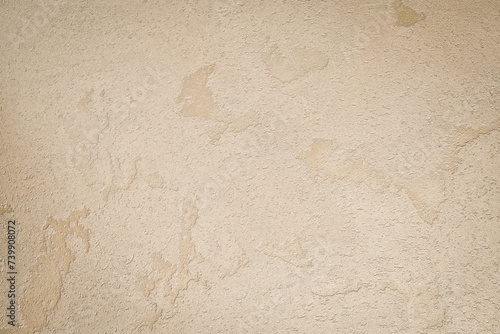 Light brown textured concrete background. Space for text. Textured surface. photo
