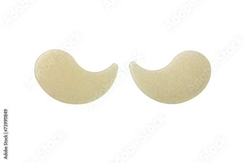 Gold hydrogel eye patches isolated on white background