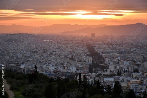sunset over the mountains of Piraeus and Athens, Greece © Ingmar