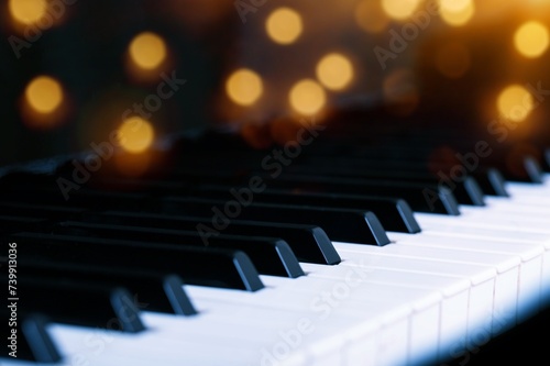 Piano keys background with bokeh. Musical instrument