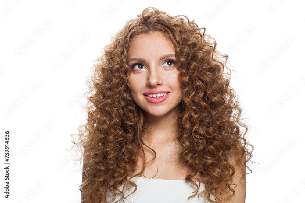 Friendly young healthy lady looking up portrait. Perfect woman with long frizzy hairstyle