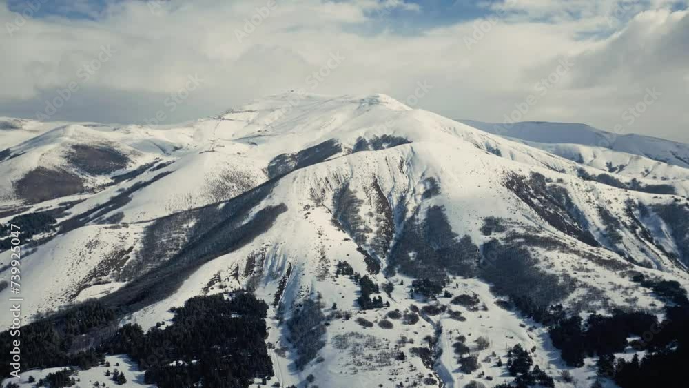 snow covered mountains in winter time snow covered mountains in winter time