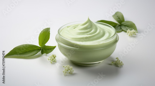 Cream with extract of Green tea on light background