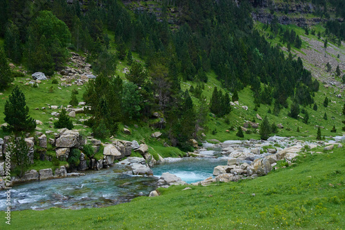 Mountain landscape with river of transparent water
