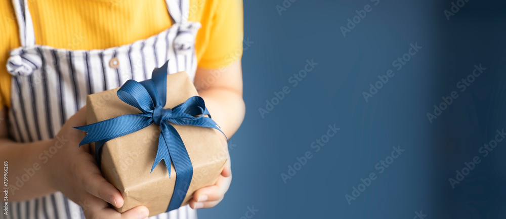 Father's day horizontal banner empty copy space. Gift box in child's hands. Present wrap. Father's day horizontal banner empty copy space. Gift box in child's hands. Present wrap.