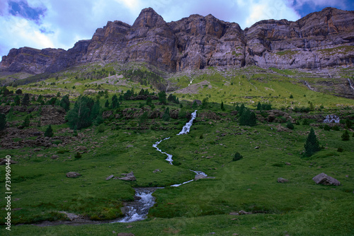 Mountain landscape with river of transparent water