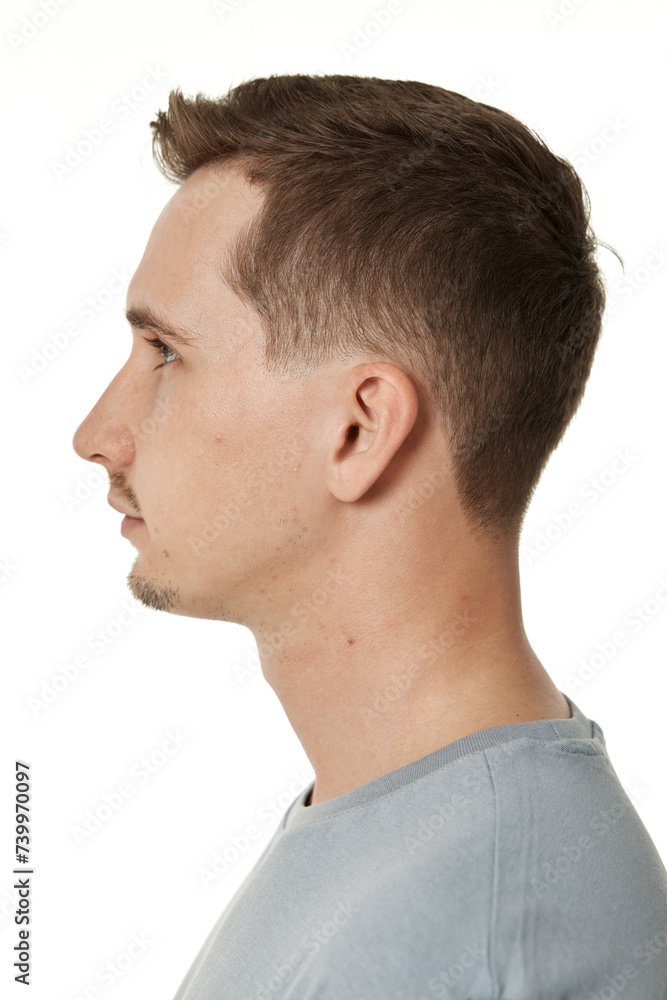 Fototapeta premium handsome young calm man on white background