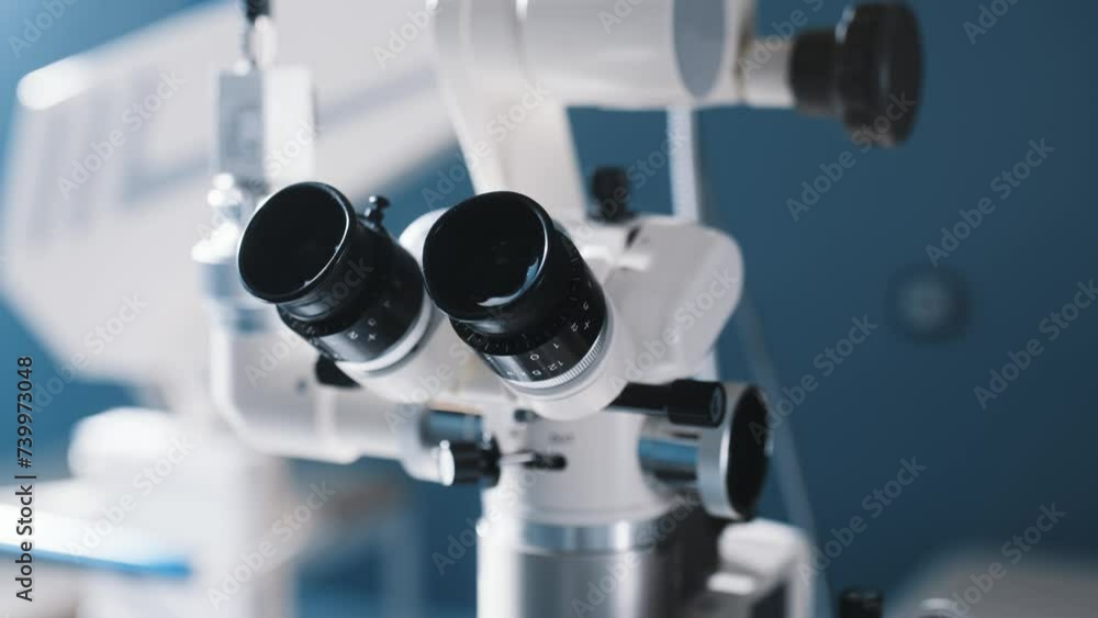 Surgical microscope in the operating room of a modern ophthalmology clinic with high-quality equipment. Vision correction, cataract treatment. Surgical microscope in the operating room of a modern ophthalmology clinic with high-quality equipment. Vision correction, cataract treatment.