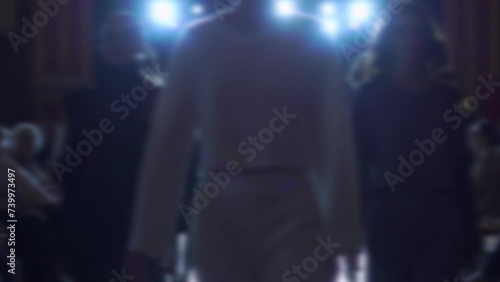 models on the catwalk in defocus. fashion Week	
