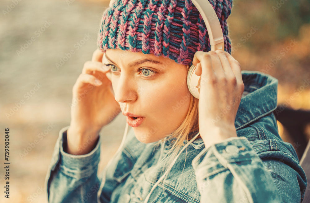 Relax in park. Hipster girl relax in park with mp3 player. Hipster woman in headphones relax in park. Listening music outdoor. audio book. Outdoors portrait of a trendy girl. Relax in park. Hipster girl relax in park with mp3 player. Hipster woman in headphones relax in park. Listening music outdoor. audio book. Outdoors portrait of a trendy girl.