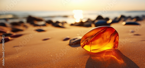 Fototapeta Naklejka Na Ścianę i Meble -  Amber on sand on the beach in sunshine