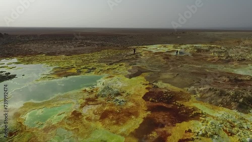 Volcanic crater lake. Dallol Geothermal area. Crystalline sulfides in an acid pool. Geothermal field of Danakil Depression. Hot springs and acid mineral in surreal landscape in Ethiopia, Africa