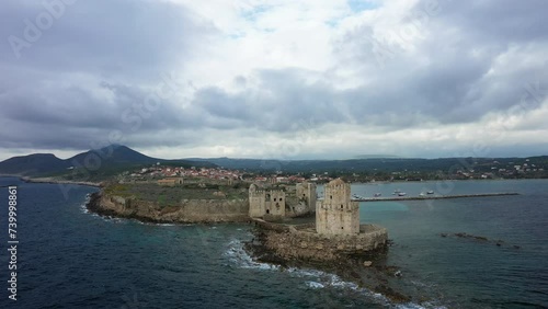 The Chateau de Methoni in Modon facing the Mediterranean Sea in Europe, Greece, the Peloponnese, Mani, in summer, on a sunny day. photo