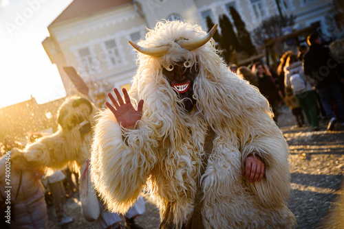 Buso on the Buso Carnival of the Sokci ethnic group. Busojaras (Buso-walking) in the town of Mohacs during the carnival period, Hungary photo