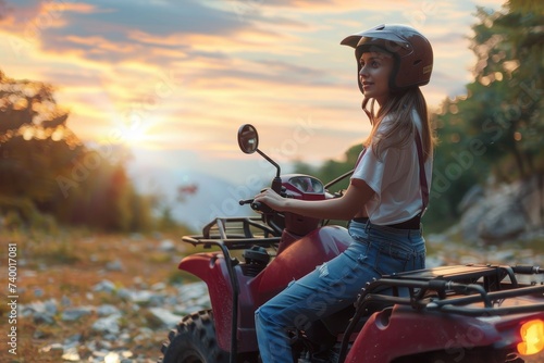 A daring woman conquers the open land on her powerful red four wheeler, the wind in her hair and the sky as her witness