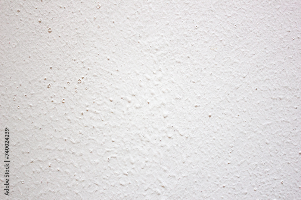 Authentic white plastered wall, background, texture. Gray and white plaster. Authentic white plastered wall, background, texture. Gray and white plaster.