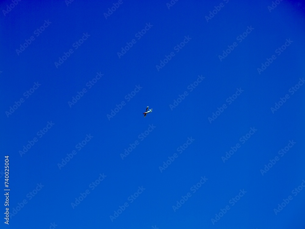 Plane flying near the Aeroclub de Castelló, El Grao de Castellón, Valencia, Spain Plane flying near the Aeroclub de Castelló, El Grao de Castellón, Valencia, Spain