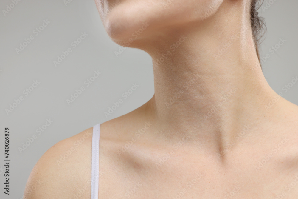 Beauty concept. Woman on grey background, closeup Beauty concept. Woman on grey background, closeup