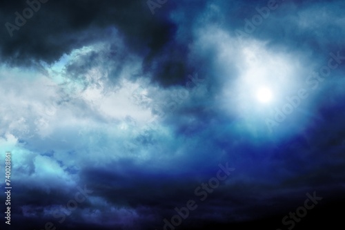 Night sky with bright light. clouds in mystic sky