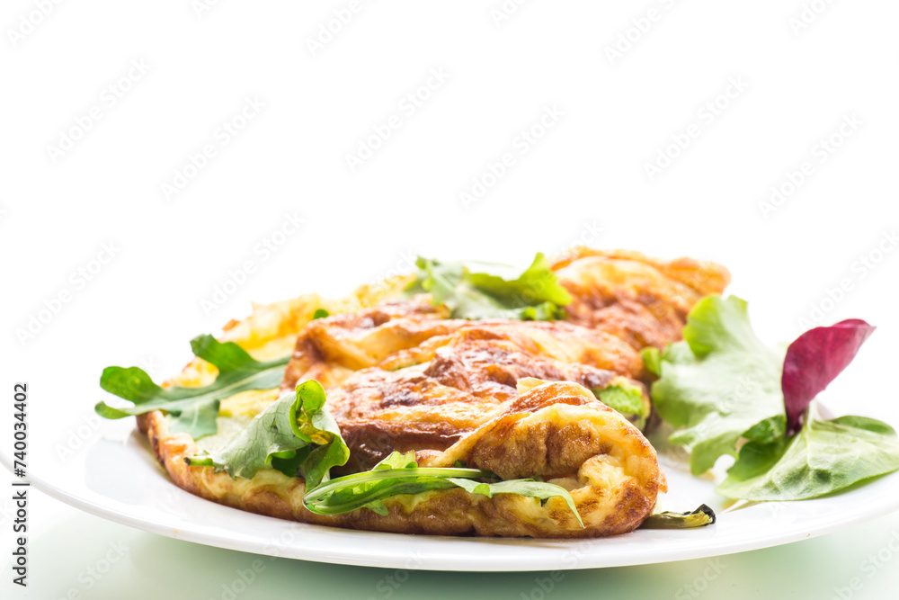 cooked fried omelets with zucchini and herbs cooked fried omelets with zucchini and herbs
