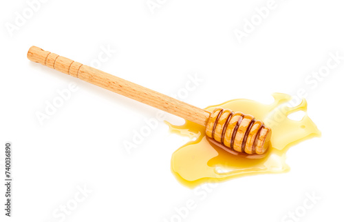 Honey with honey dipper isolated on white background