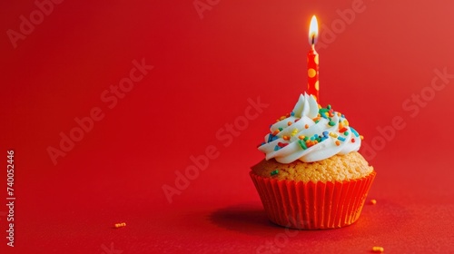 birthday minimalist vivid background with cupcake with candle