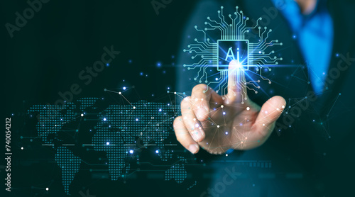 Fotografie AI ,Business visionary points to AI letter icon on a world map, symbolizing the strategic utilization of AI in global business