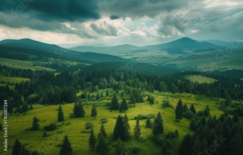 forest green aerial footage shot just before storm clouds come over mountain ...