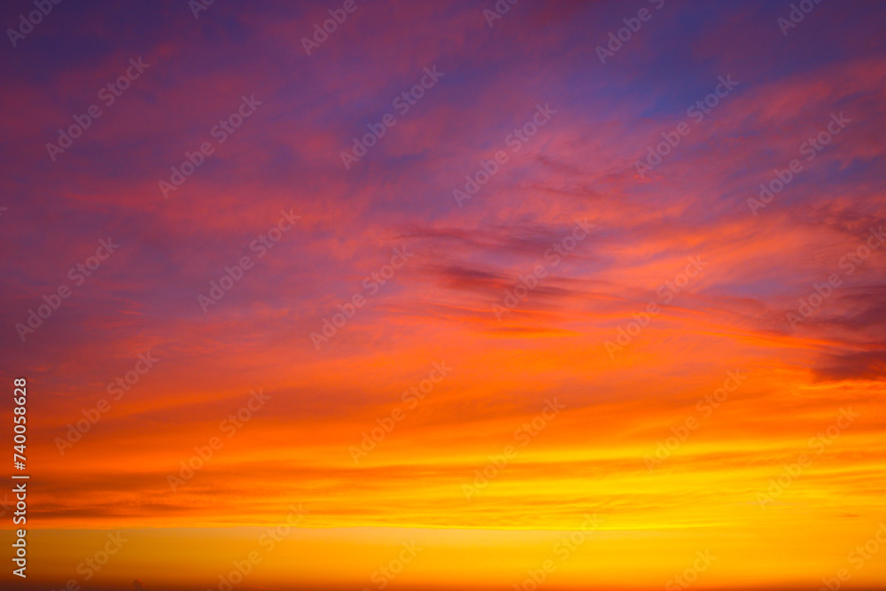 Clouds and different color tones in the sky at sunset. Dance of colors in the sky. Amazing and incredible sunset.