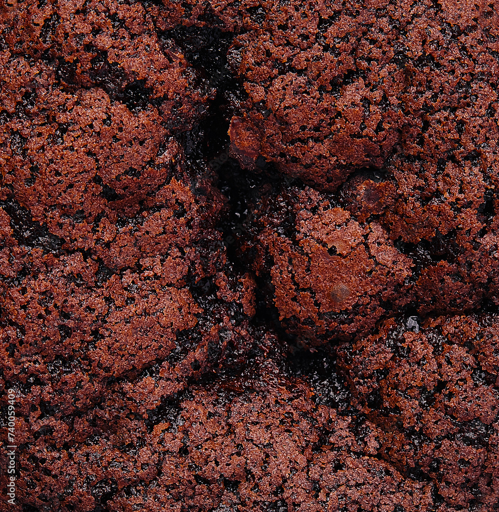 Delicious chocolate brownie close up background Delicious chocolate brownie close up background