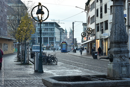  City Tramway and Bicycle Parking by Cobblestone Street with Cafe in Germany