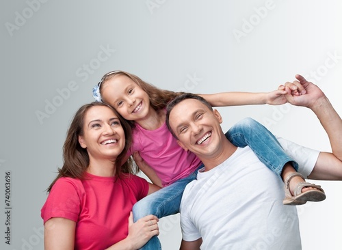 Happy young family posing with child © BillionPhotos.com
