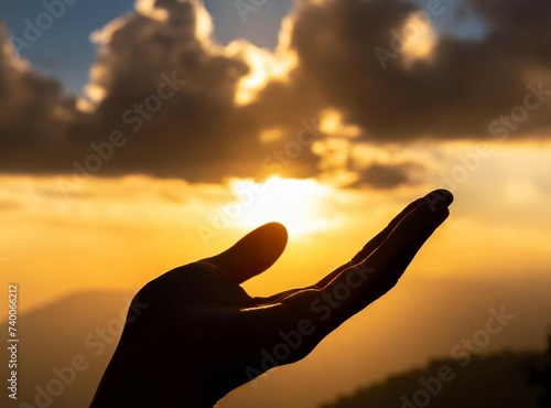 Hand reaching the sky closeup