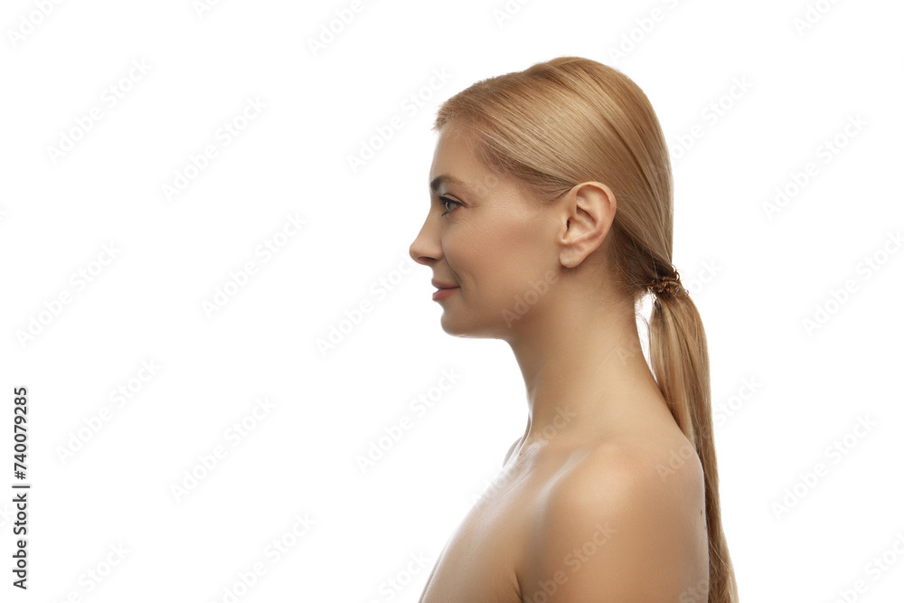 Side view portrait of young attractive woman with bare shoulders posing against white studio background. Plastic surgery and liposuction. Concept of beauty, anti aging, cosmetology, female health. Ad Side view portrait of young attractive woman with bare shoulders posing against white studio background. Plastic surgery and liposuction. Concept of beauty, anti aging, cosmetology, female health. Ad
