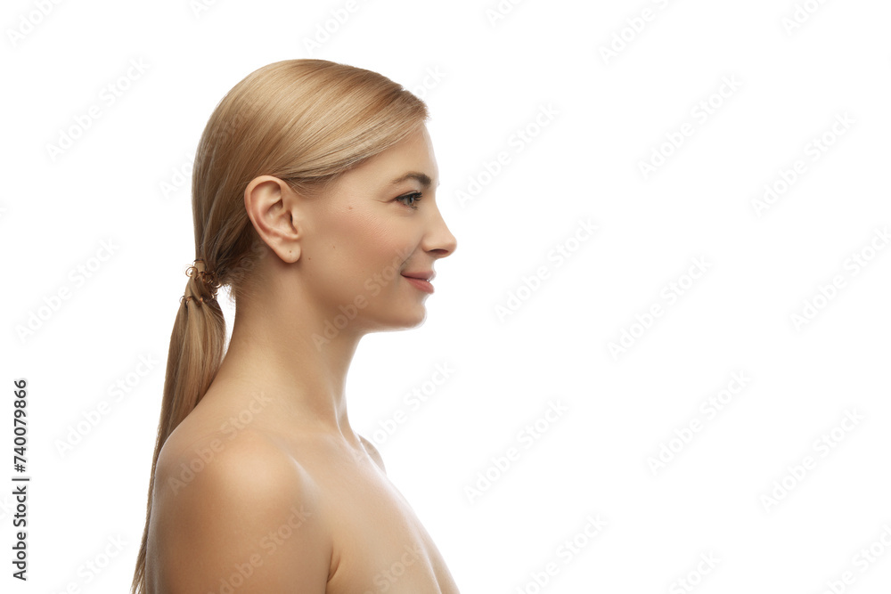 Side view portrait of young, beautiful, tender woman smiling looking away against white studio background. Concept of natural beauty, anti aging, cosmetology, plastic surgery, spa treatments. Ad Side view portrait of young, beautiful, tender woman smiling looking away against white studio background. Concept of natural beauty, anti aging, cosmetology, plastic surgery, spa treatments. Ad