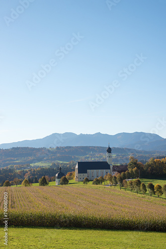 beautiful pilgrimage church Wilparting, bavarian alps, and cornfield