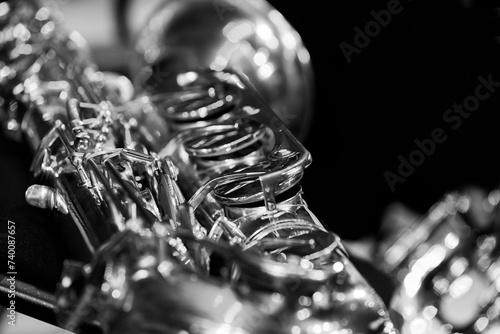 Photography Close-up fragment of saxophone valves in black and white