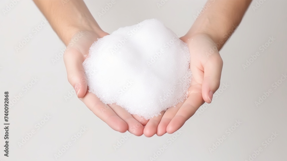 White bubbled foam in hands, hair foam, foam for man, white textured, hand full of soap isolated on white background White bubbled foam in hands, hair foam, foam for man, white textured, hand full of soap isolated on white background