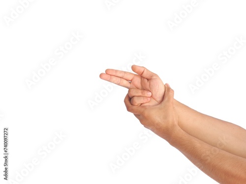 Male hand making a gesture like holding a gun, gun symbol or shooting a gun, isolated on white background.