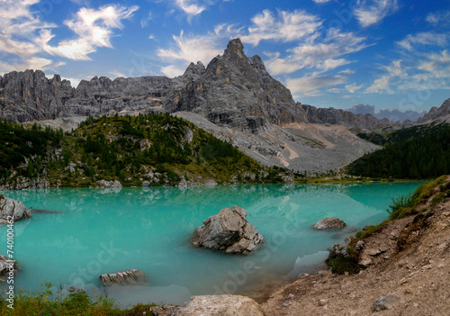 Turquoise Sorapis Lake in Cortina d'Ampezzo, with Dolomite Mountains and Forest - Sorapis Circuit, Dolomites, Italy, Europe