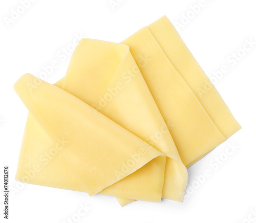 Slices of tasty fresh cheese isolated on white, top view
