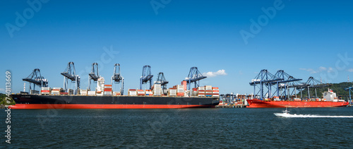 Docks in Panama Canal with Panama City skyline, Panama