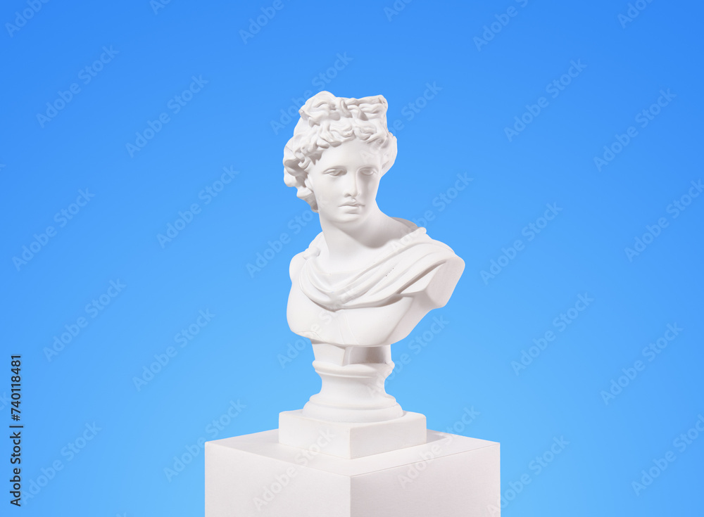 White statuette and creation. Antique composition.