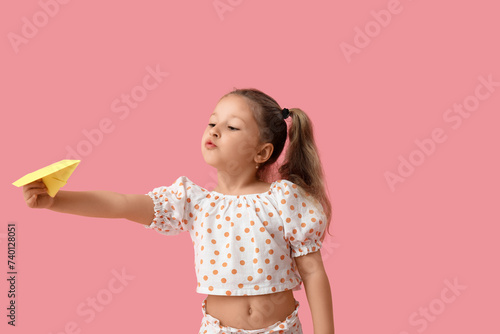 Cute little girl with paper...
