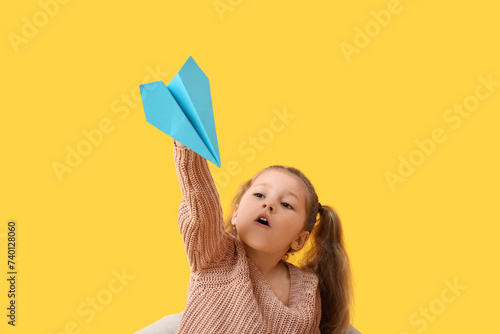 Cute little girl with paper...