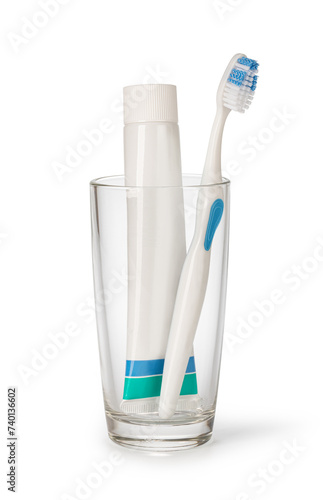 Toothbrush and toothpaste in glass © Gresei