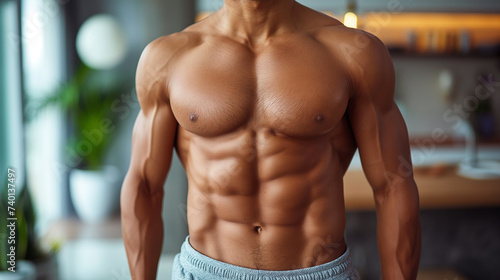 Torso of fitness modelwith well defined muscles.
