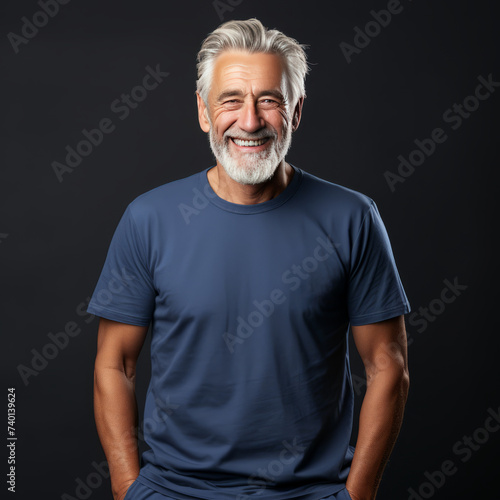 Smiling old men wearing blue T-Shirt Mockup on black studio background